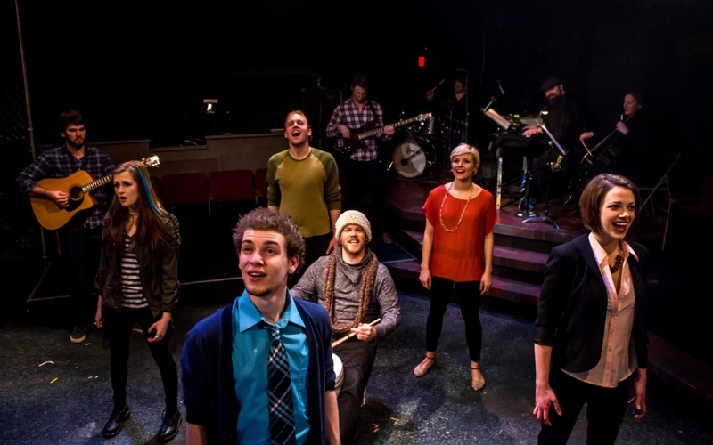 Mia Fitzgibbon, Nat Zegree, Zachary Stewart, Kayla Eilers, and Emily Schultheis with drummer Ben Handel performing "Too Much" at the Bloomington Playwrights Project 2014 production of ISLAND SONG